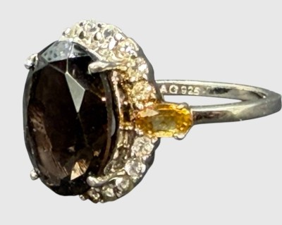 Auktion 376<br>Silberring-925- mit braunen Topas, umringt von klaren Steinen, RG 60, 5 gr [1]