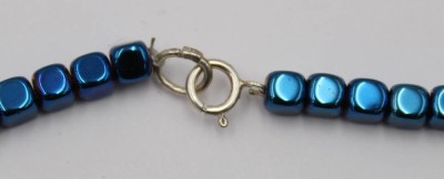 Auktion 376<br>blaue Hämatit-Halskette, Silberschließe, ca. L-40cm [1]