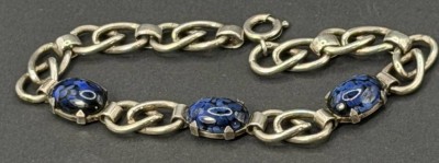 Auktion 376<br>massive Silber-835- Armband mit 3 blau marmorierten Steinen (1x gerissen), L-20,5 cm, 20,44 gr [1]