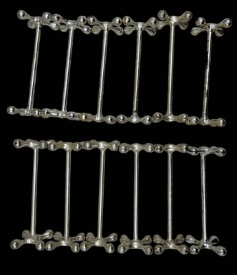 Auktion 376<br>12x versilberte Messerbänke 
