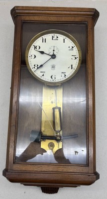 Auktion 376<br>elektr. Wanduhr 