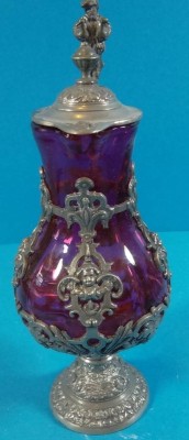 Auktion 339<br>kl. Weinkännchen, lila Glas und Zinnmontur, H-16 cm [1]