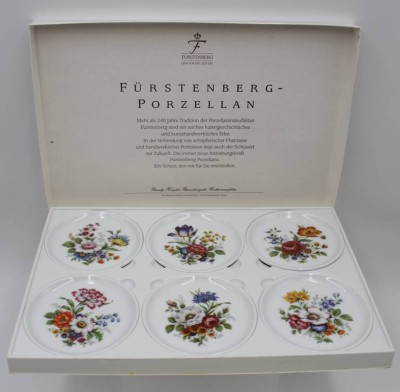 Auktion 340<br>6x Untersetzer, Fürstenberg, florale Dekore, orig. Karton, ca. D-10cm. [1]