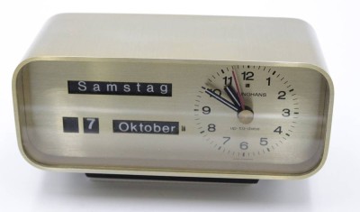 Auktion <br>Tischuhr, Junghans up-to-date, Batteriewerk, läuft, H-11,5cm B-20,5cm T-8,5cm. [1]
