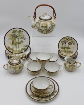 Auktion <br>Teeservice, Japan, florales Dekor, 21 Teile, Teekanne (Deckel geklebt), Milch und Zucker, 6x kompl. Gedecke, Kanne H-12,5cm Tassen H-4,6cm. [1]