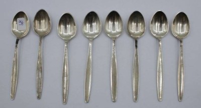 Auktion 366<br>8x Mokkalöffel, Georg Jensen, Cypress, 925er Silber, zus. 118,7gr., L-11cm. [1]