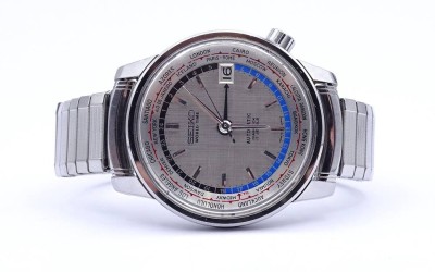 Auktion 344<br>Herren Armbanduhr SEIKO World Timer, 6217, Automatikwerk, Werk läuft, D. 37mm, Glas mit Kratzern [1]
