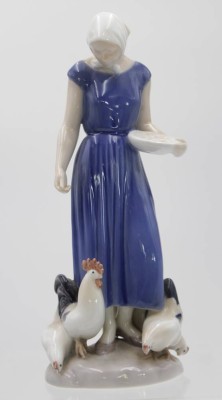 Auktion 348<br>Porzellan-Figur, Hühnermagd, Bing & Gröndahl, Copenhagen, Entw. Axel Locher, Mod.Nr. 2220, H-23,5cm, 2 Schleifstriche [1]