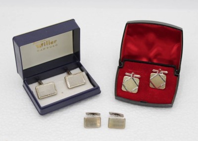 Auktion <br>3 div. paare Manschenttenknöpfe, je 835er Silber, zus. 35,8gr. [1]