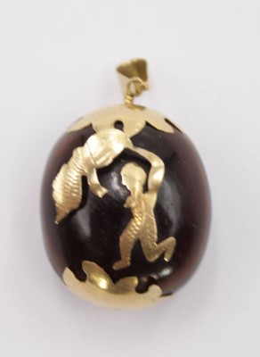 Auktion 350<br>Anhänger, wohl Tigerauge mit 14 K Goldauflage, ca. L-3,5cm [1]