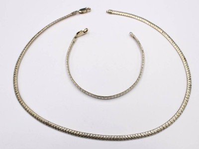 Auktion 352<br>925er Silber-Set, Kette und Armband, zus. ca. 29,5gr., L-44,5cm u. L-19cm [1]