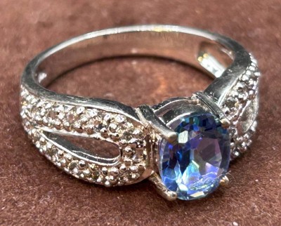 Auktion 352<br>Silberring-925-, blauer Centerstein, um ringt von klaren, RG 54, 3,9 gr [1]
