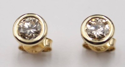 Auktion 353<br>585er GG-Ohrstecker mit zus. 0,54 ct Diamanten, zus. 1,1gr. ca. D-0,6cm [1]