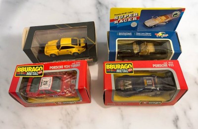Auktion 355<br>4x div. Druckguss-Automodelle 1:43, x Burago Porsche, in OVP [1]