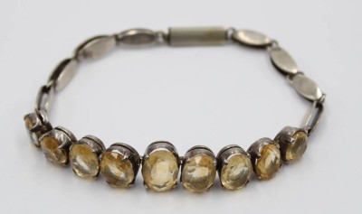 Auktion 356<br>Armband mit gelben Steinen,  Silber bis auf Schließe, 15,4gr., L-20cm [1]