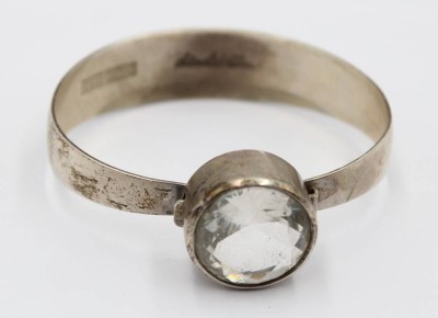 Auktion 356<br>925er Silber-Armspange, BeH, Lindström, klarer facett. Stein, 27,7gr., ca. D-6cm [1]