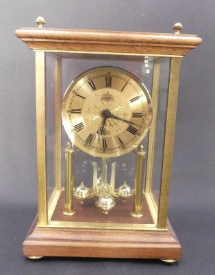 Auktion 357<br>Quartz Jahrersuhr in Holzrahmen, allseitig verglast, H-26 cm, 18x14 cm, Werk nicht geprüft [1]