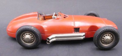 Auktion 357<br>gr. Blech Rennwagen mit Schwungradantrieb, L-23 cm [1]