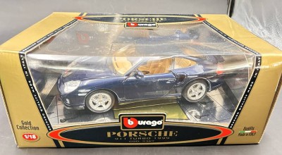 Auktion 357<br>Burago Porsche 911, 1:18, neu in OVP, blau [1]