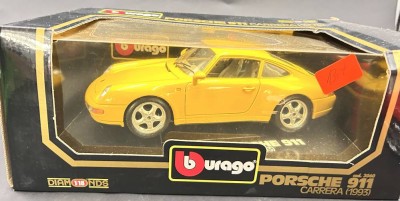 Auktion 357<br>Burago Porsche 911, 1:18, neu in OVP, gelb [1]