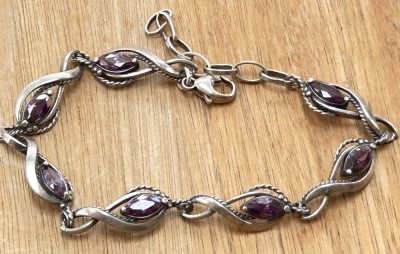 Auktion 358<br>Silber-Armkette-925- mit violetten Steinen, max. L21 cm, 11,7 gr [1]