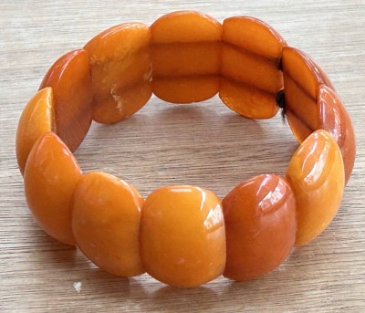 Auktion 358<br>Bernstein Armband, Zugband, H-2,5 cm. 24.8 gr [1]