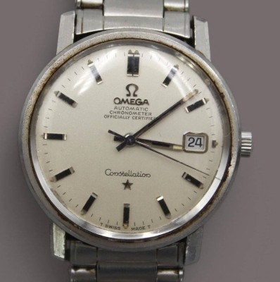 Auktion 358<br>Vintage-Herren-Armbanduhr, OMEGA Constellation,  Automatik, Werk läuft, D-3,5cm, leichte Tragespuren [1]