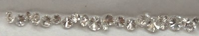 Auktion 358<br>kl. runde Brillanten, 0,9 bis 2 mm, zusammen ca. 0,81 ct [1]