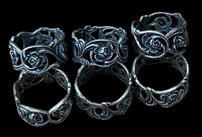 Auktion 358<br>6x kl. Serviettenringe, Silber-800-, Rosenmuster, D-20 cm, 17,7 gr [1]
