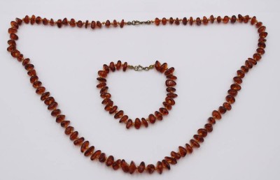 Auktion 359<br>Bernstein-Set, Kette und Armband, zus. 28,3gr. , L-72cm u. 22cm [1]