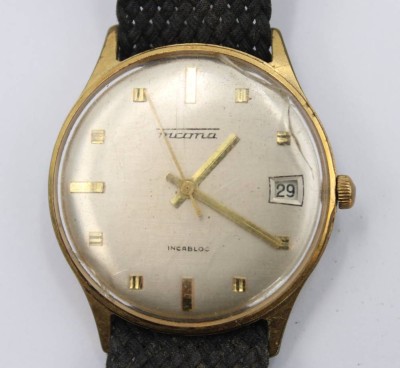 Auktion 359<br>Vintage-Herrenarmbanduhr, Incoma, Handaufzug, Werk läuft, Glas gerissen, Tragespuren, D-3,5cm [1]