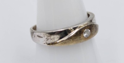 Auktion 359<br>925er Silber-Ring, klarer Stein, teilw. vergoldet, 5,4gr., Tragespuren., RG 62 [1]