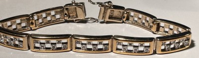 Auktion 359<br>Pierre Lang Armband, vergoldet, klare Steine, L-19,5 cm [1]