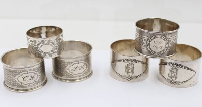 Auktion 359<br>6x div. Serviettenringe, davon 4x Silber (gepr.), 78gr., 2x 90er Auflage, 5x mit Ziermonogramm, ca. D-4,2 bis 5,2cm [1]