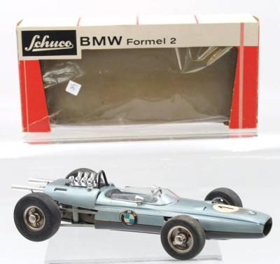 Auktion 359<br>Schuco BMW Formel 2, 1968-71, Blech, im Boden gemarkt, 1:16,  Nr. 1072, ab ei orig. Karton, dieser mit Läsuren, L-22cm, Werk läuft, ohne Schlüssel [1]
