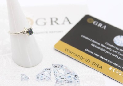 Auktion 359<br>Ring mit einem 0,5ct Regenbogen-Moissanite, Zertifikat anbei, RG 53 [1]