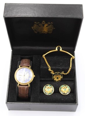 Auktion 360<br>Schmuckset, wohl Russland, Quarzarmbanduhr, Manschettenknöpfe und Kravattenklammer in orig. Kasten, Uhr D-3,3cm [1]