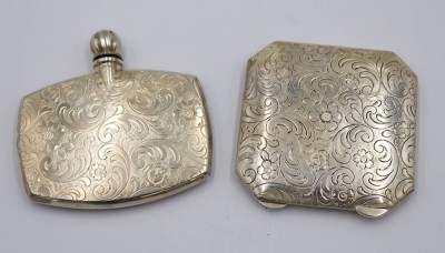Auktion 360<br>Flacon sowie Puderdose, je in 835er Silber, florale Ziselierungen, zus. ca. 87gr., Flacon ca. 6,5 x 6,5cm [1]