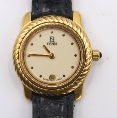 Auktion 360<br>Damen-Armbanduhr, FENDI, 810L, Quarzwerk nicht geprüft, Lederband mit Tragespuren, ca. D-2,5cm [1]