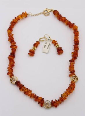 Auktion 360<br>Set, Bernstein, vergoldete Zierelemente, Kette und Ohrhänger, zus. ca. 31,2gr., L-21cm u. L-5cm [1]