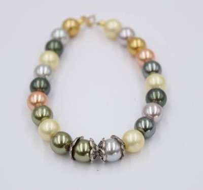 Auktion 360<br>Muschelkernperlen-Armband, Goldschließe, versilberte Zierelemente, ca. L-18cm [1]