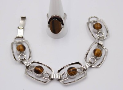 Auktion 360<br>Armband und Ring, Tigerauge, 800/835er Silber, zus. ca. 38gr., Armband L-20cm, Ring mit offener Schiene [1]