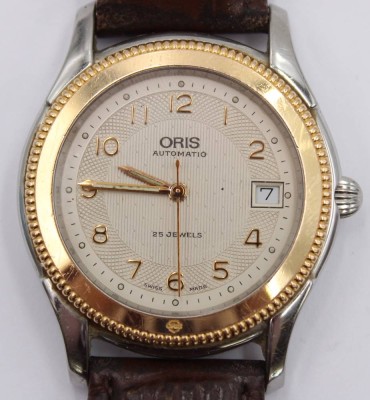 Auktion 360<br>ORIS Herrenarmbanduhr, Automatik, Ref. 7452, Werk läuft, Lederband mit Tragespuren, Uhr im guten Zustand, D-3,5cm [1]