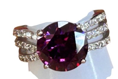 Auktion 361<br>Silberring-925- lila Centerstein, umringt von klaren Steinen, RG 54, 6 gr. [1]