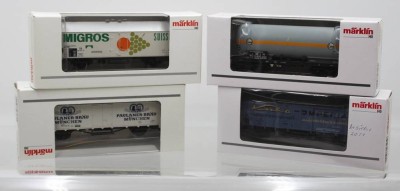 Auktion 361<br>4x div. Güterwaggons mit Werbeaufschriften. Märklin, H0, je in OVP [1]