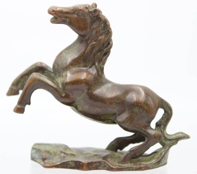 Auktion 361<br>Ein kleines Bronzepferd , gemarkt . [1]