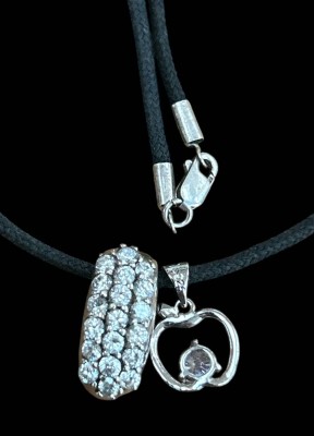 Auktion 361<br>Stoffband mit Silber-925- Anhänger, klare Steine [1]