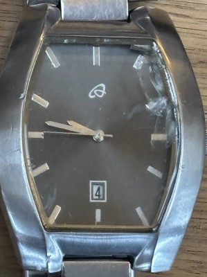 Auktion 362<br>Ovim Quartz HAU mit Stahlband, Glas bestossen, ansonsten gut, NG [1]