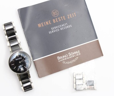 Auktion 363<br>Armbanduhr, Bruno Söhnle Uhrenatelier Glashütte, Algebra 2, Quarzwerk nicht geprüft, leichte Tragespuren, D-3cm, anbei Papiere [1]
