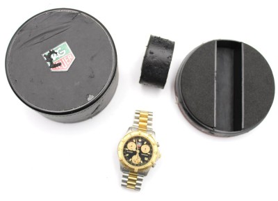 Auktion 363<br>Herren-Armbanduhr, Tag Heuer Professional Stahl/Gold Chronograph 1/10, Quarz, Werk steht, Alters-u. Tragespuren, anbei Box (schlechte Erhaltung), ca. D-3,8cm [1]
